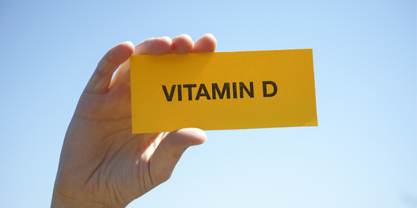 Et gult kort med ordet vitamin D